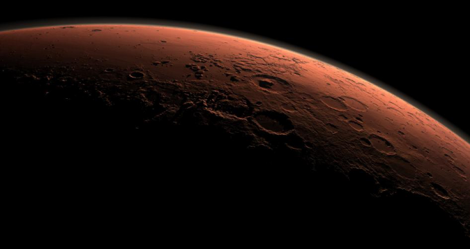 Ilustración de Marte vista desde el espacio, usada como apoyo visual para una investigación sobre un meteorito proveniente del planeta rojo.